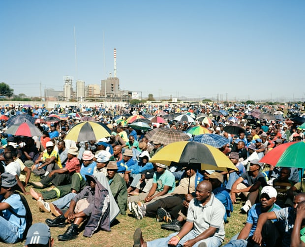 Striking miners gather at Wonderkop Stadium in Marikana