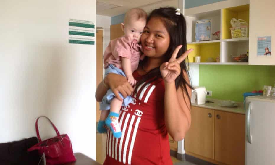 Thai surrogate mother Pattaramon Chanbua poses with baby Gammy.