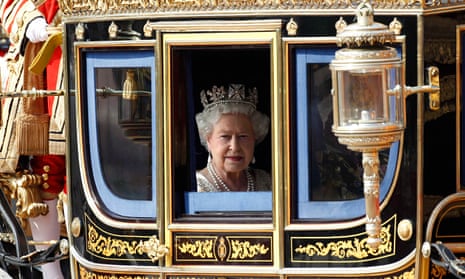 Queen Elizabeth in a horse-drawn carriage 