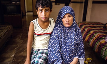 Salwa al-Bakr with her son Sayed. The family lost their son Mohamed during the air strike on Gaza City's beach.
