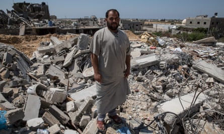 Salah al-Najjar, who dug into the rubble with his hands for two hours to rescue some of his brother's family when their home was hit. Seven members of the family were killed. 