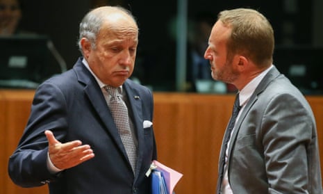 French minister Laurent Fabius gives a perfect Gallic shrug to Danish Foreign Minister Martin Lidegaard  at the start of a EU foreign affairs meeting in Brussels.