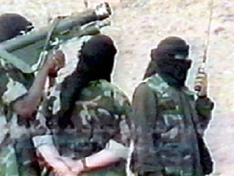 File photograph of militants training in Afghanistan in 2001 with a Russian-made anti-aircraft missile.