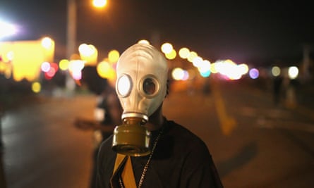 Ferguson demonstrator in gas mask