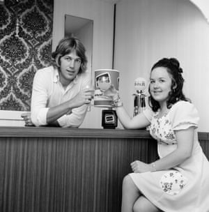 Tommy Taylor of West Ham United enjoys a drink at home with his wife Pat.