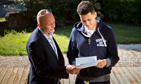 Kai Coates (right) reads his GCSE results with his headteacher Trevor Orchard and 