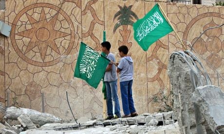 Palestinians raise Hamas flags