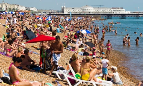 People on the beach in Brighton, East Sussex.