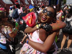 two women embracing at the notting hill carnival