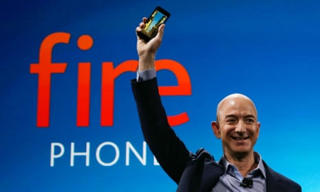 Jeff Bezos holding the Amazon Fire Phone at the launch in July.