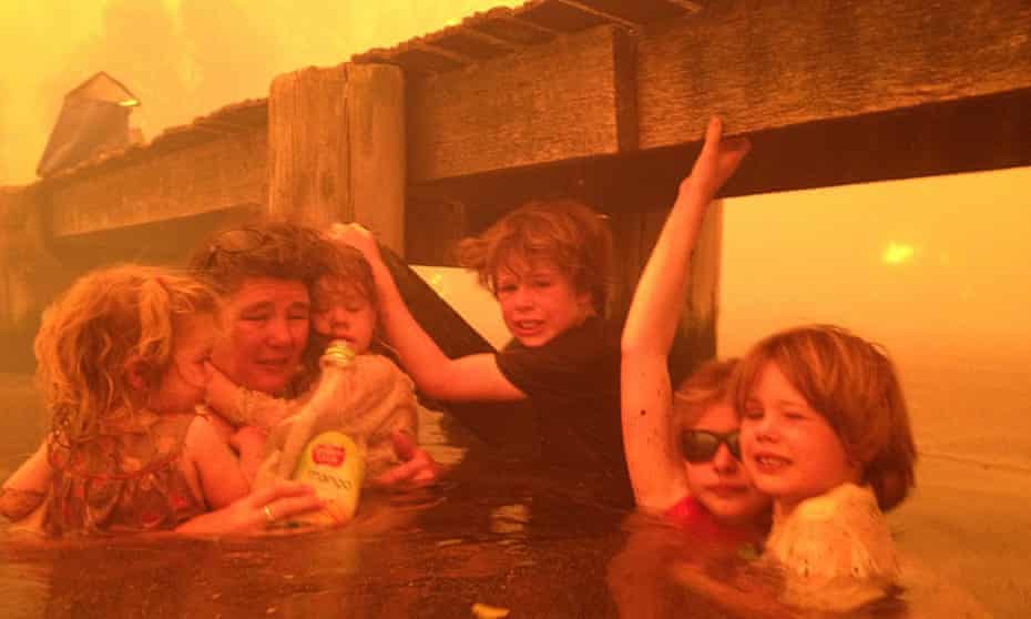 Australia's hottest year of 2013 started with a heatwave that caused widespread bush fires. In January the Holmes family from Tasmania took refuge under a jetty as wild fires raged around them.