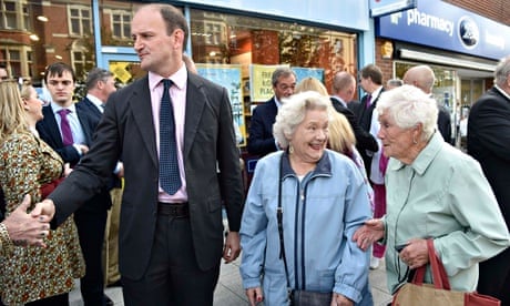 Douglas Carswell meets passers-by as he walks through Clacton-on-Sea