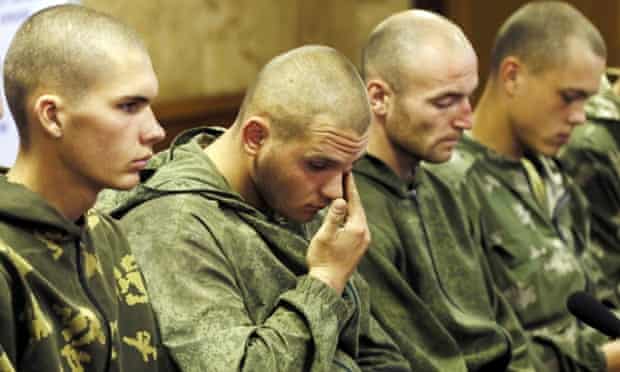 Photo is said to show Russian paratroopers captured by Ukrainian forces near a village in the Amvrosiivka district of Donetsk. Russia said the troops strayed into Ukraine by accident.