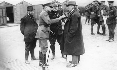 French commander Joseph Joffre, centre, talks to David Lloyd George and Sir Douglas Haig
