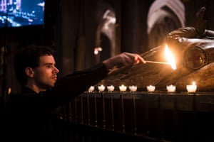 People light candles during a Vigil of Prayer and Penitence on the centenary of the outbreak of the First World War at Bath Abbey