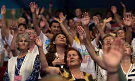 Christian worshippers pray during a evangelical rally in Jerusalem
