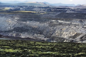 The opencast coal mine in Muli run by the Kingho energy group, 20 June 2014, Qinghai. Opencast mining results in large pits dug into green alpine meadows. ©Wu Haitao/Greenpeace