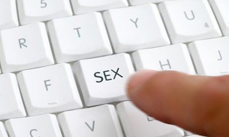 A finger pushing a keyboard button that says 'Sex' on it