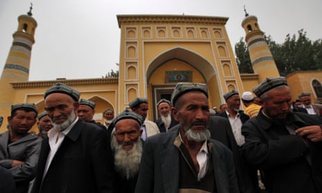 Uighur Muslim men outside a mosque in the Xinjiang region of China.