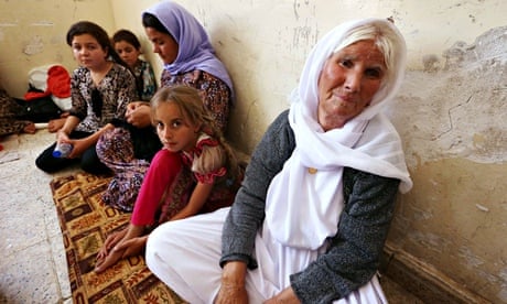 An Iraqi Yazidi family that fled the violence in Sinjar