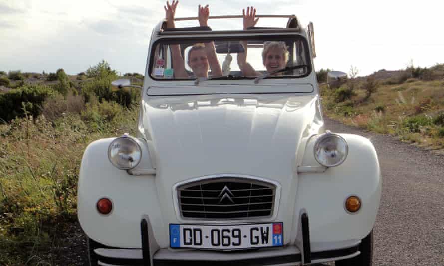 Liz Boulter (on the right) in a Citroen 2CV car in Narbonne, France