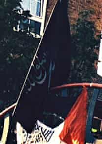 The jihadi flag outside the Poplar estate showing the Arabic script