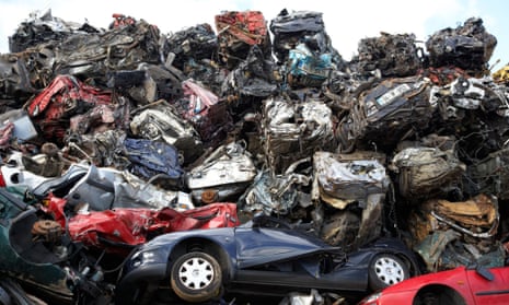 Piles of crushed cars at a metal recycling site in Belfast, Northern Ireland.