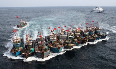 A fleet of illegal Chinese fishing vessels attempts to evade the South Korean Coast Guard
