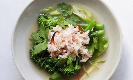 Miso broth in a bowl with crabmeat piled on broccoli