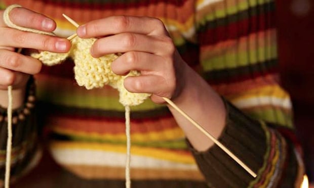 Young woman knitting
