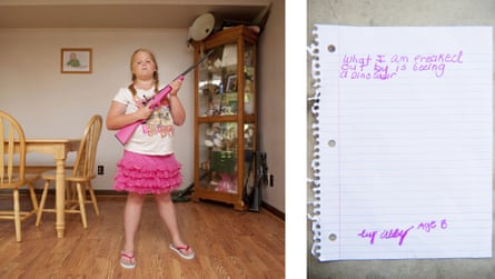 Abby, eight, from Louisiana, poses with her gun for An-Sofie Kesteleyn's My Little Rifle, a series of photographs capturing young girls from the southern US with their firearms.