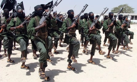 Al-Shabaab fighters perform military exercises in the Lafofe area near Mogadishu, Somalia.