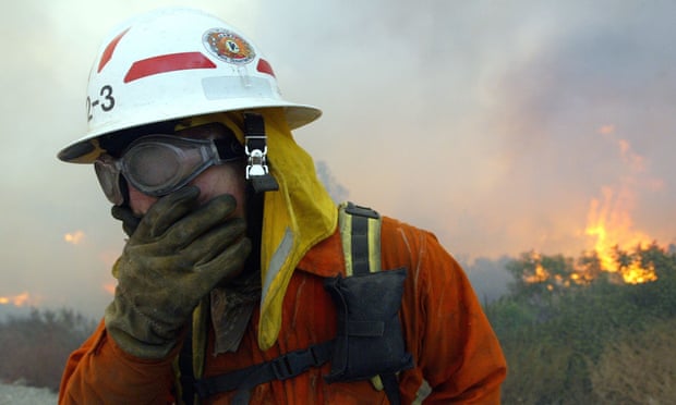 firefighter covers mouth smoke california