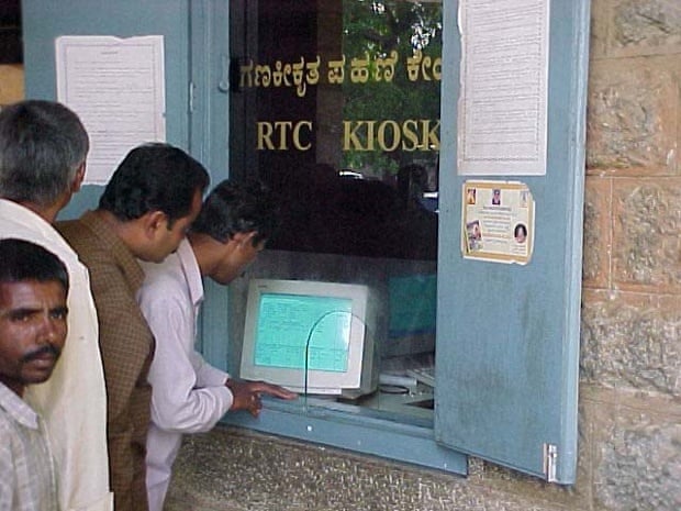 Farmers receiving services from bhoomi kiosk
