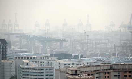 A general view over looking the Tanjong Pagar container port covered with smog in Singapore on September 15, 2014. Air pollution hit unhealthy levels due to smog from fires in Indonesia