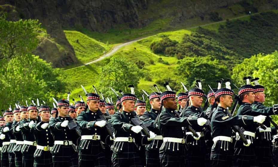 The King’s Own Scottish Borderers parade in the grounds of Holyrood Palace, Edinburgh.