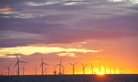 The Walney offshore windfarm project, off Barrow in Furness, Cumbria, UK, at sunset.