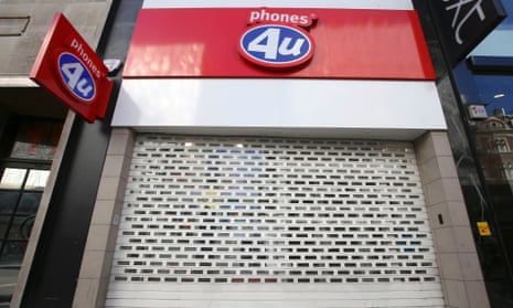 A Phones 4U shop in Oxford Street in central London with its shutters down as more than 500 of its stores were shut after the retail chain went into administration.
