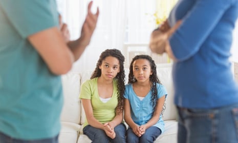 Children watch as parents argue