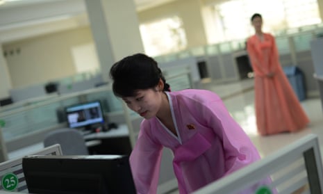 A North Korean woman checks a computer a at music software company in Pyongyang.
