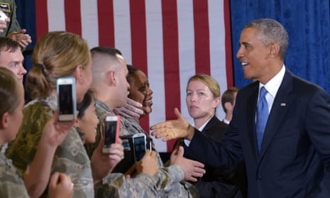 Barack Obama greets military personnel as he arrives to speak from MacDill Air Force Base in Tampa, Florida.
