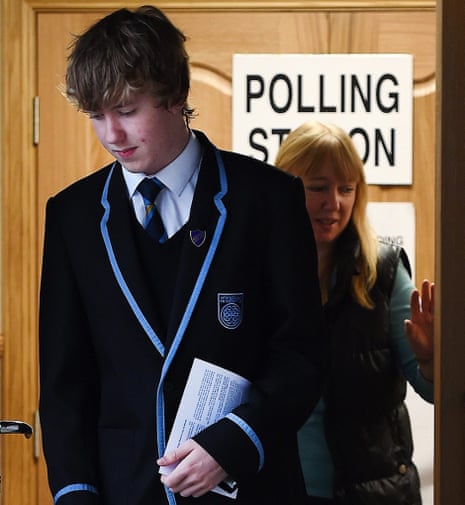 A student exits a polling station in Strichen in Aberdeenshire
