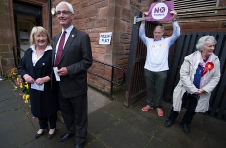 Alistair Darling with his wife Maggie (left) and No campaigners outside the polling station at the Church Hill Theatre in Edinburgh.
