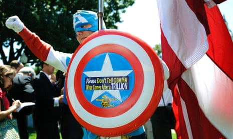 A man dressed as Captain America poses with Tea Party supporters in Washington.