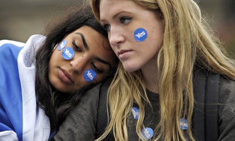 Pro-independence supporters console each other after a no vote in the Scottish referendum