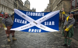 Pro-independence voters from the Western Isles of Lewis and Bute march down Edinburgh’s Royal Mile to protest against Scotland’s independence referendum results, blaming scaremongering by the BBC.
