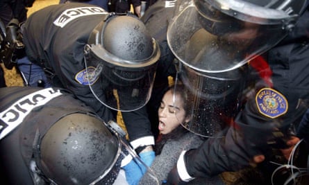 An Occupy Portland protester is arrested by officers.
