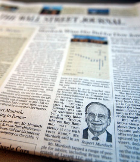 A photograph of the front page of the edition of the Wall Street Journal reporting on Rupert Murdoch's News Corp purchase of Dow Jones & Co.