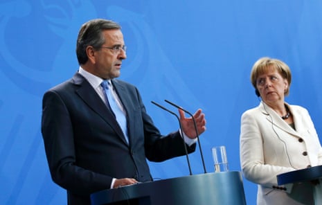 Greek prime minister Antonis Samaras and German chancellor Angela Merkel address a joint news conference in Berlin. Photo: Reuters/Fabrizio Bensch