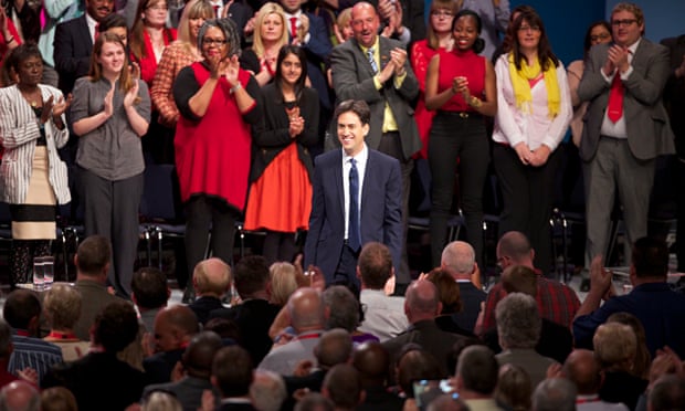 Labour leader Ed Miliband is applauded by party members at the end of his speech